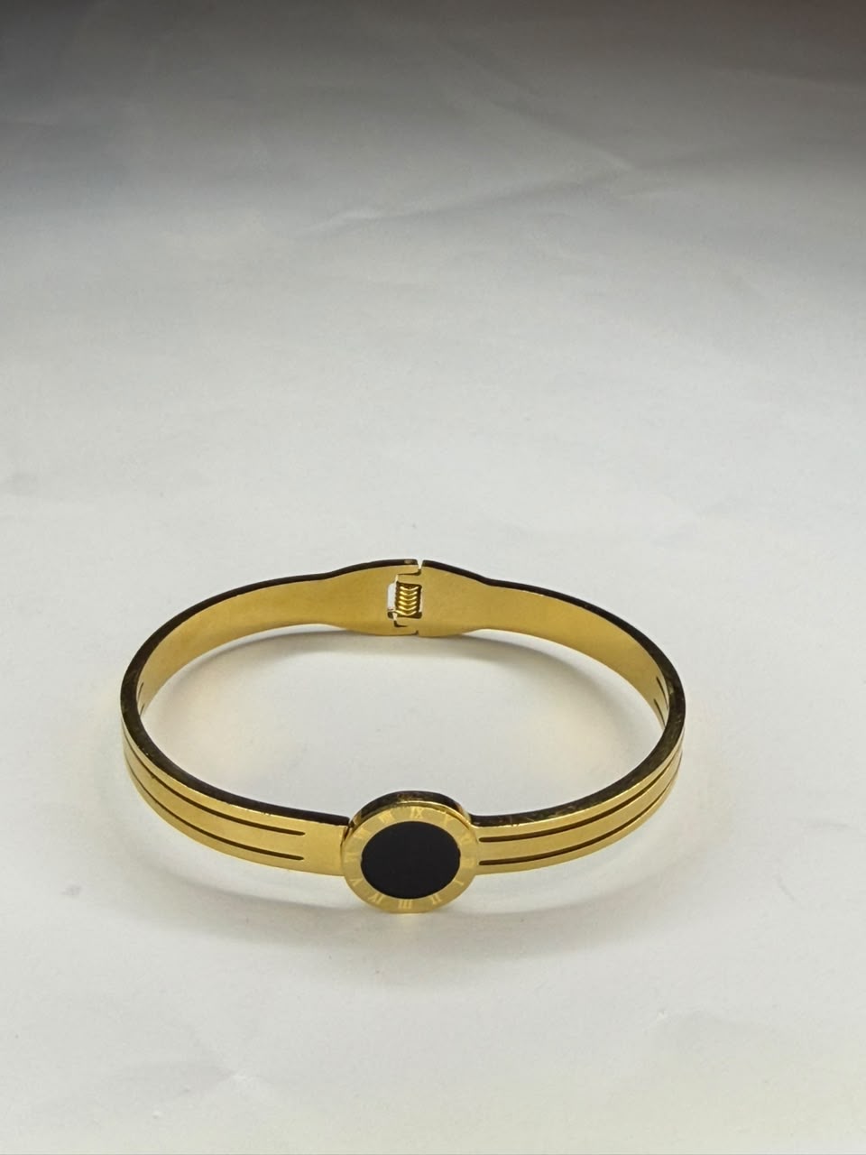 Roman Numeral & Black Disc